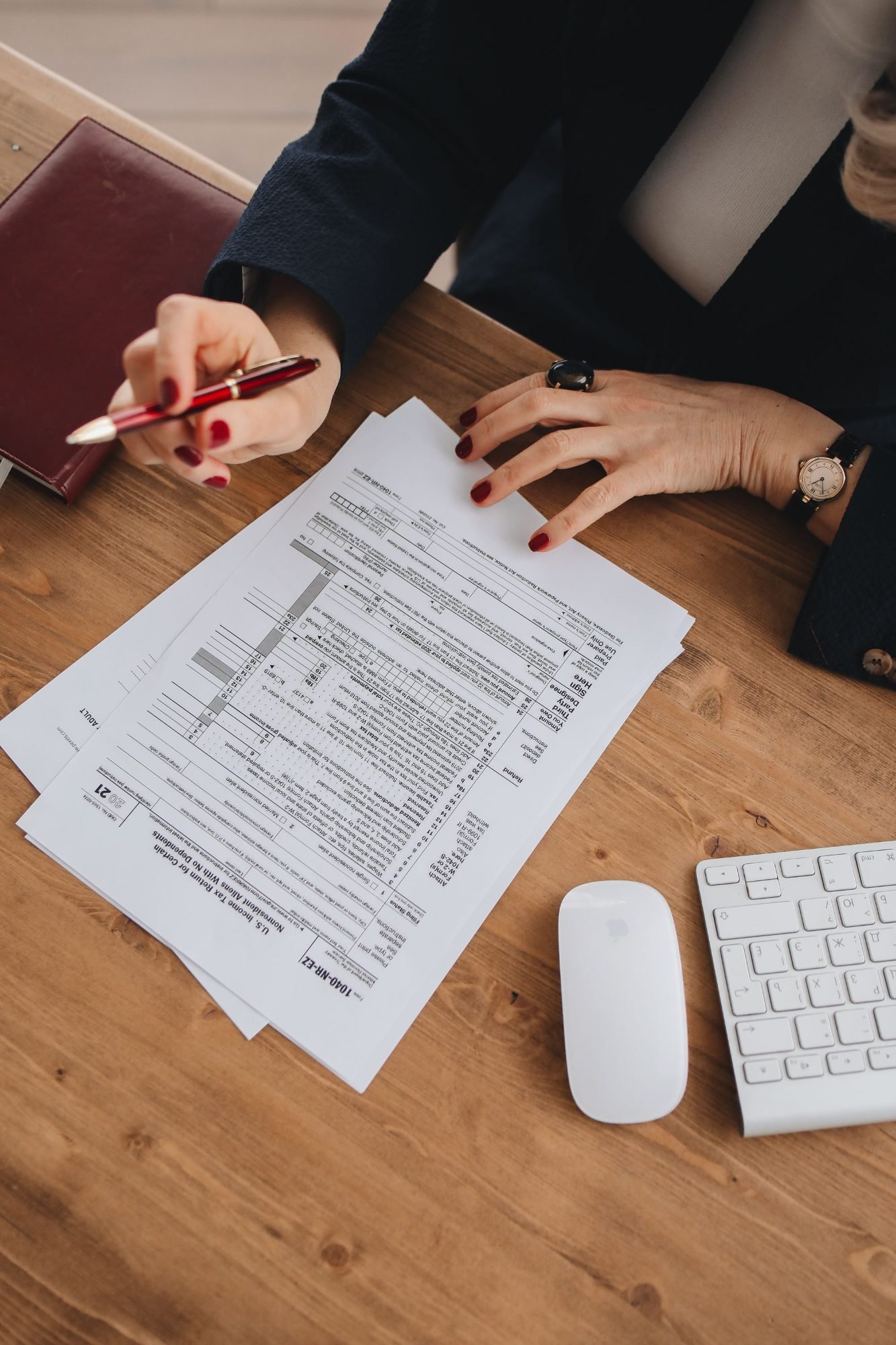 Reviewing a tax form with a pen